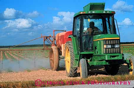 Stock Photo #1292: keywords -  agriculture crop danger dithane environment equipment farm field florida food grow hazard homestead horz industry job machine pesticide poison pollution risk spray squash tractor work