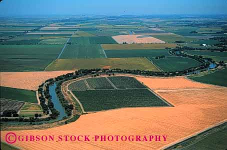 Stock Photo #1299: keywords - aerial aerials agriculture american california crop crops crossroads curve curves curving curvy elevated farm farming farmland farms field fields food geometric grid grow horizon horz land landscape patchwork produce river rivers sacramento scenery scenic sky twist twisting valley winding