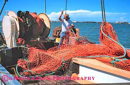 Stock Photo #1321: keywords -  boat boats california career colorful commercial equipment eureka fisherman fishing fix fixes fixing hard horz income job jobs man marine men mend mending net nets occupation ocean oceans orange outdoor outdoors outside released resource sea sew sewing sews ship summer water work worker workers working works