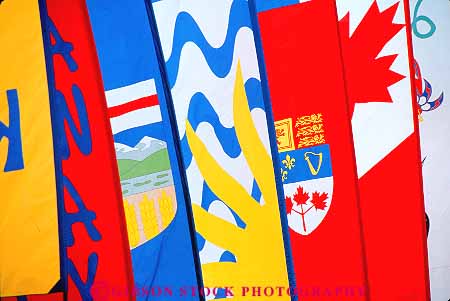 Stock Photo #15751: keywords -  banner banners bright cheerful cloth color colorful colors decorate decorates decorating decorative different display exterior fabric geometric geometrical geometry horz many material of outdoor outside pattern patterns shape shapes synthetic wind