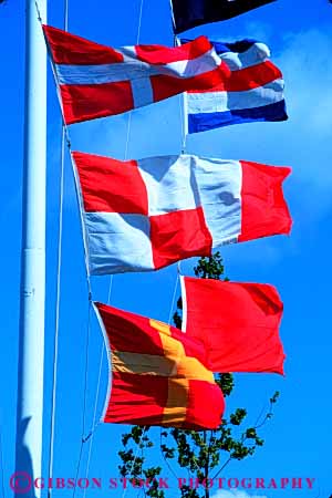 Stock Photo #6075: keywords -  code color colorful communicate communicated communicating communications flag flags language maritime message pole read ship shipping signal symbol vert
