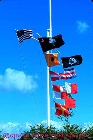 Stock Photo #6076: keywords -  code color colorful communicate communicated communicating communications flag flags language maritime mast message pole read ship shipping signal symbol vert
