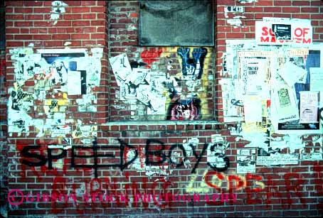 Stock Photo #1326: keywords -  art brick building buildings color damage draw graffiti horz paint painted paints papers poster posters property spray trash vandal vandalized wall