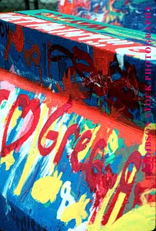 Stock Photo #1327: keywords - art assorted assortment bright color colorful colors concrete damage different draw graffiti graphic of paint painted paints property spray vandal varied variety various vert wall