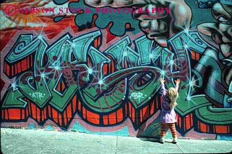 Stock Photo #1329: keywords - abstract art child color damage draw graffiti horz model paint property released spray vandal wall
