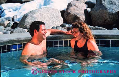 Stock Photo #1331: keywords -  affection close communicate couple happy horz hot in intimate laugh outdoor private relax released smile soak spa swim talk together tub water winter