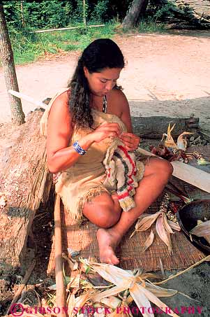 Stock Photo #15782: keywords - american art ceremonial color colorful costume costumed costumes craft crafting crafts decent dress ethnic heritage in indian indians lineage make maker makes making massachusetts minority native north people person plantation plimoth plymouth reconstructed reenact reenacted reenacting reenactment reenactments reenactor reenactors reenacts tradition traditional tribal tribe tribes vert village wampanoag wapanoag weave weaves weaving woman women