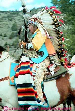 Stock Photo #15784: keywords -  american ceremonial color colorful costume costumed costumes decent dress elder ethnic headress heritage horseback indian indians lineage man men minority native north oregon people person reservation springs tradition traditional tribal tribe tribes vert warm