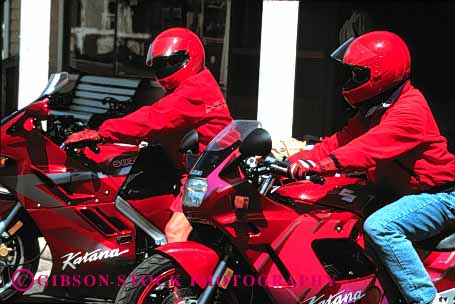 Stock Photo #1356: keywords -  carefree country couple cruise drive driver glide helmet horz motorcycle red ride share sightsee steer suit together tour vacation vehicle