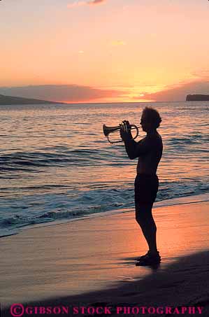 Stock Photo #15811: keywords - beach beaches brass dark dusk evening flugal hawaii horn instrument instruments man maui mood moody music musical musician musicians people perform performance performer performers person player playing plays released show showing shows silhouette sound sunset sunsets surf tropic tropical tropics vert warm water wind