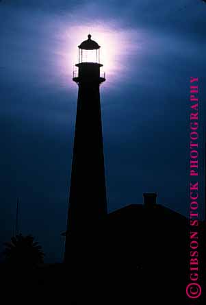 Stock Photo #1370: keywords -  beam bright coast direction guidance lighthouse ocean safety silouette tall vert warning