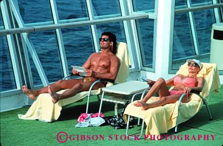 Stock Photo #1394: keywords -  adventure bathing boat couple cruise fun horz model ocean princess read relax released royal sea share ship suit summer sunbath sunshine tan together travel trip tropical vacation warm