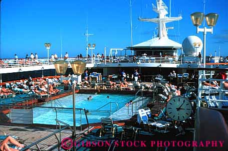 Stock Photo #1410: keywords - adventure america cruise deck horz ocean of pool recreation sea ship song travel trip tropical vacation