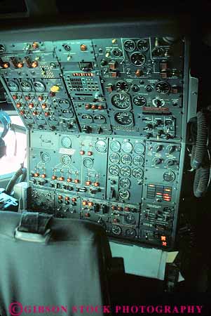 Stock Photo #15934: keywords -  airplane airplanes array cockpit complex complicated control controls dial dials electronic electronics equipment flight fly flying flys gauge gauges indicator indicators intricate jet machine panel panels plane planes vert