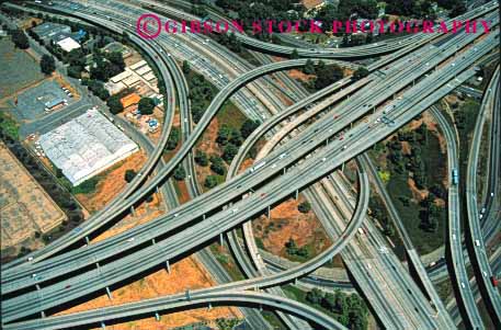 Stock Photo #1478: keywords - aerial auto california car city cloverleaf commute drive elevate freeway highway horz interchange intersection interstate move pavement road sacramento street suburb traffic transportation truck vehicle