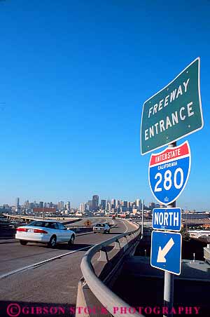 Stock Photo #16050: keywords - auto automobiles autos blue california car cars cities city direct direction divided downtown drive drives driving eighty entrance entry francisco freeway freeways highway highways hwy interstate pavement ramp ramps red road roads route routes san sign signs skyline street streets system transport transportation travel two vehicles vert white