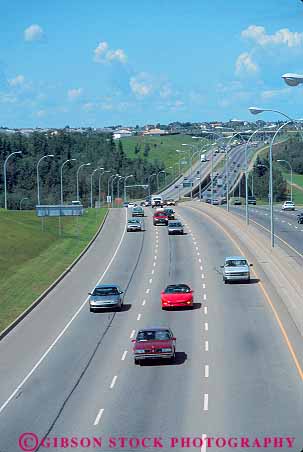 Stock Photo #16056: keywords - alberta auto automobiles autos canada car cars country countryside divided drive drives driving edmonton elevate elevated forest freeway freeways green greenbelt highway highways hill hills hwy interstate landscape open overhead overview parkway pavement road roads route routes rural scenery scenic space street streets system terrain traffic transport transportation travel vehicles vert view views