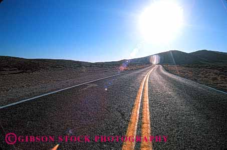Stock Photo #1487: keywords -  highway horz nevada open road street sun