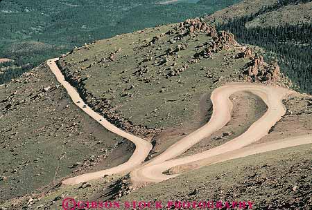 Stock Photo #16081: keywords -  colorado crooked curve curved curves curving curvy dirt highways horizon horizons horz hwy in isolated landscape line linear lines mountain mountains narrow pavement peak pikes primitive region remote road roads rocky rough route routes scenery scenic street streets taper tapering tapers transport transportation travel turn turning turns winding