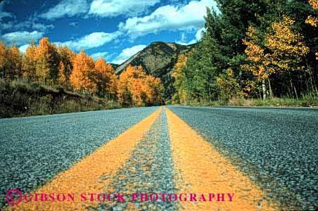 Stock Photo #1507: keywords -  aspen autumn closeup colorado country countryside fall foliage horz landscape mountain remote road route rural scenic street stripe yellow