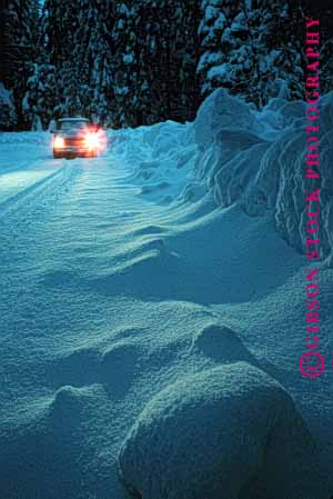 Stock Photo #1523: keywords -  alone california car cold country countryside danger dim dusk landscape lights low reduced remote risk road route rural slippery snow storm street vert visibility winter