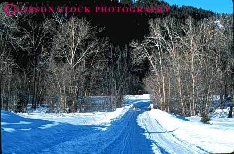 Stock Photo #1532: keywords -  cold country countryside danger horz idaho landscape mountain remote risk road route rural slippery snow storm street sun tree valley winter