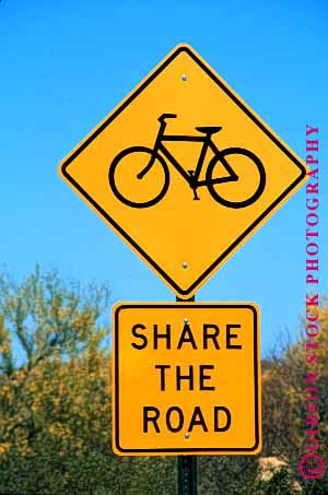 Stock Photo #1548: keywords - car caution driving highway road safety sign square street traffic vert yellow