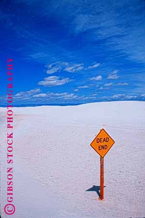 Stock Photo #1552: keywords -  caution dead desert driving empty end highway horizon nowhere road safety sand sign square stop street traffic vert yellow