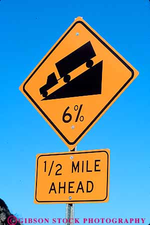 Stock Photo #13714: keywords - caution downhill drive driving grade gravity highway highways hill hills roads sign signs steep traffic truck trucks vert warn warning yellow