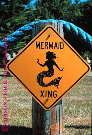 Stock Photo #1561: keywords -  art caution crossing cute humor mermaid sign traffic vert warning yellow