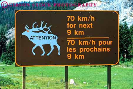 Stock Photo #1563: keywords -  bilingual canada communicate english french highway horz kilometers language sign symbol traffic translate warning wildlife