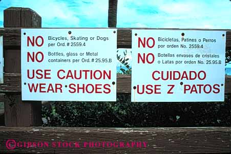 Stock Photo #6052: keywords -  advertise beach bilingual communicate communicated communicating communication display english horz information informative informed informing language law laws mexican miami no public regulation regulations rule rules sign spanish word words