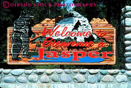 Stock Photo #1565: keywords -  announce bear canada carve colorful encourage greet horz jasper national paint park receive sign visitor welcome wood