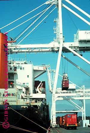 Stock Photo #1576: keywords -  california commerce container crane equipment industry lift loading oakland of port ship shipping transportation truck vert