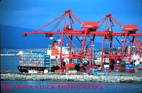 Stock Photo #1580: keywords -  canada commerce container crane equipment horz industry lift of port red ship shipping transportation vancouver