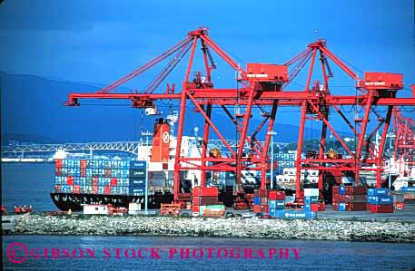 Stock Photo #1580: keywords - canada commerce container crane equipment horz industry lift of port red ship shipping transportation vancouver