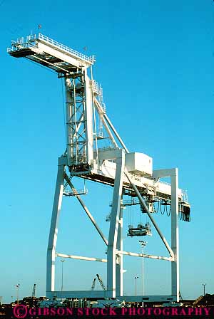 Stock Photo #16146: keywords -  california cargo cargoes commercial contain container containers containing contains crane cranes equipment freight heavy horse idle in industrial industry moves moving oakland ocean oceangoing outline port sea seaworthy shape shaped ship shipping ships transport transportation transporting transports vert water white