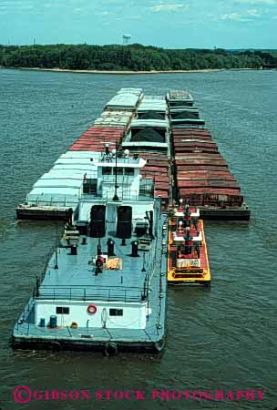 Stock Photo #6184: keywords -  barge boat canal commerce illinois industry mississippi push river ship shipping transport transportation transporting tugboat vert water work