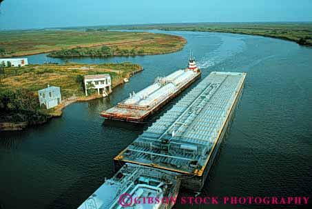 Stock Photo #6187: keywords - barge barges boat canal commerce horz industry intercoastal push river ship shipping texas transport transportation transporting tugboat water waterway work