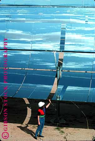 Stock Photo #1610: keywords - absorb alternative california collect convert electricity energy environment equipment heat high industry luz parabolic power reflect research site solar sun technician technology utilization vert woman