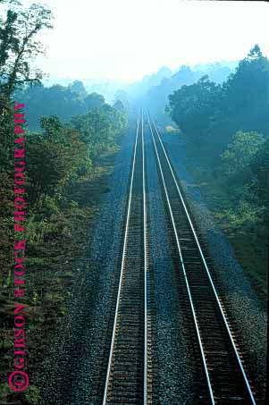 Stock Photo #1618: keywords -  elevated industry parallel railroad shipping steel tracks train transportation vert view