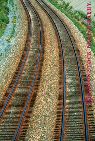 Stock Photo #1619: keywords -  elevated geometric geometry industry lines parallel railroad shipping steel tracks train transportation vert view