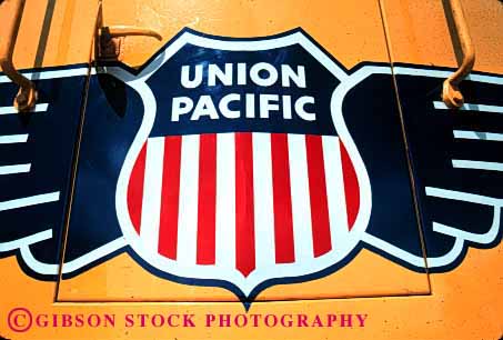 Stock Photo #1621: keywords -  americana blue engine equipment horz industry locomotive logo machine pacific railroad red shield shipping train transportation union white wing yellow