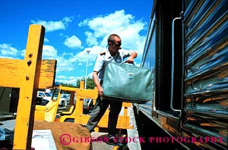 Stock Photo #1625: keywords - baggage banff handler horz industry job load passenger railroad service shipping station train transportation work