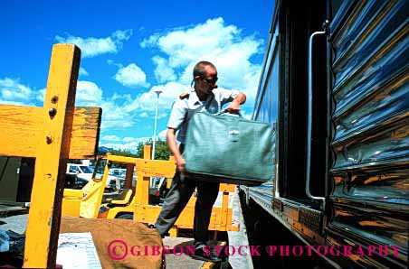 Stock Photo #1625: keywords -  baggage banff handler horz industry job load passenger railroad service shipping station train transportation work