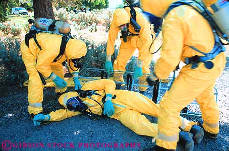 Stock Photo #12540: keywords - assist assisting bright caution contain containment crew danger dangerous emergencies emergency equipment fireman firemen haz hazard hazardous hazmat help helping horz injured injury job jobs mat material materials mats member occupation overcome partner partners people poison poisonous protect protecting protection protective protects public rescue rescues rescuing respond responding responds response risk safety save saving substance substances suit synthetic team teams toxic work worker workers working works yellow