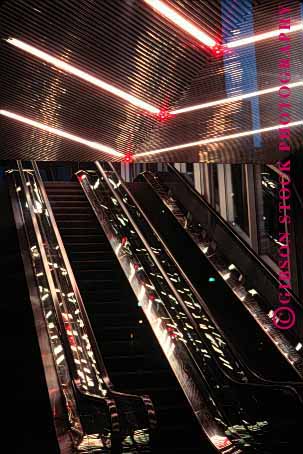 Stock Photo #1659: keywords - architecture curve escalator geometric geometry interior lighting lines lobby parallel pattern vert