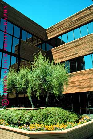 Stock Photo #1668: keywords -  architecture business commerce design geometric lo modern vert windows
