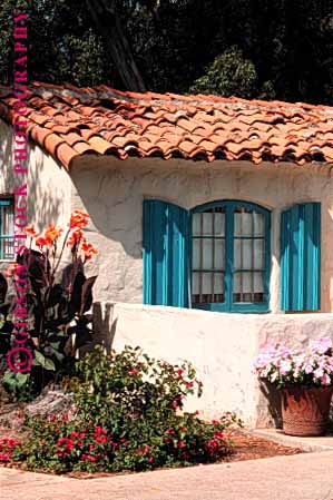 Stock Photo #1681: keywords -  adobe architecture clay home house roof spanish stucco tile vert