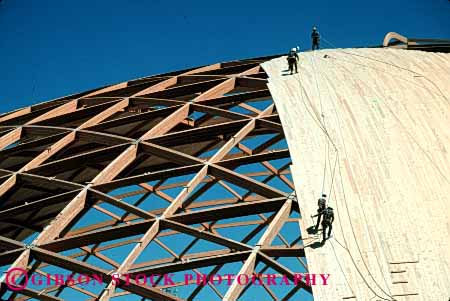 Stock Photo #1710: keywords -  architecture circle construction dome engineer fall horz men pattern radial risk rotunda round safety symmetry wood workers